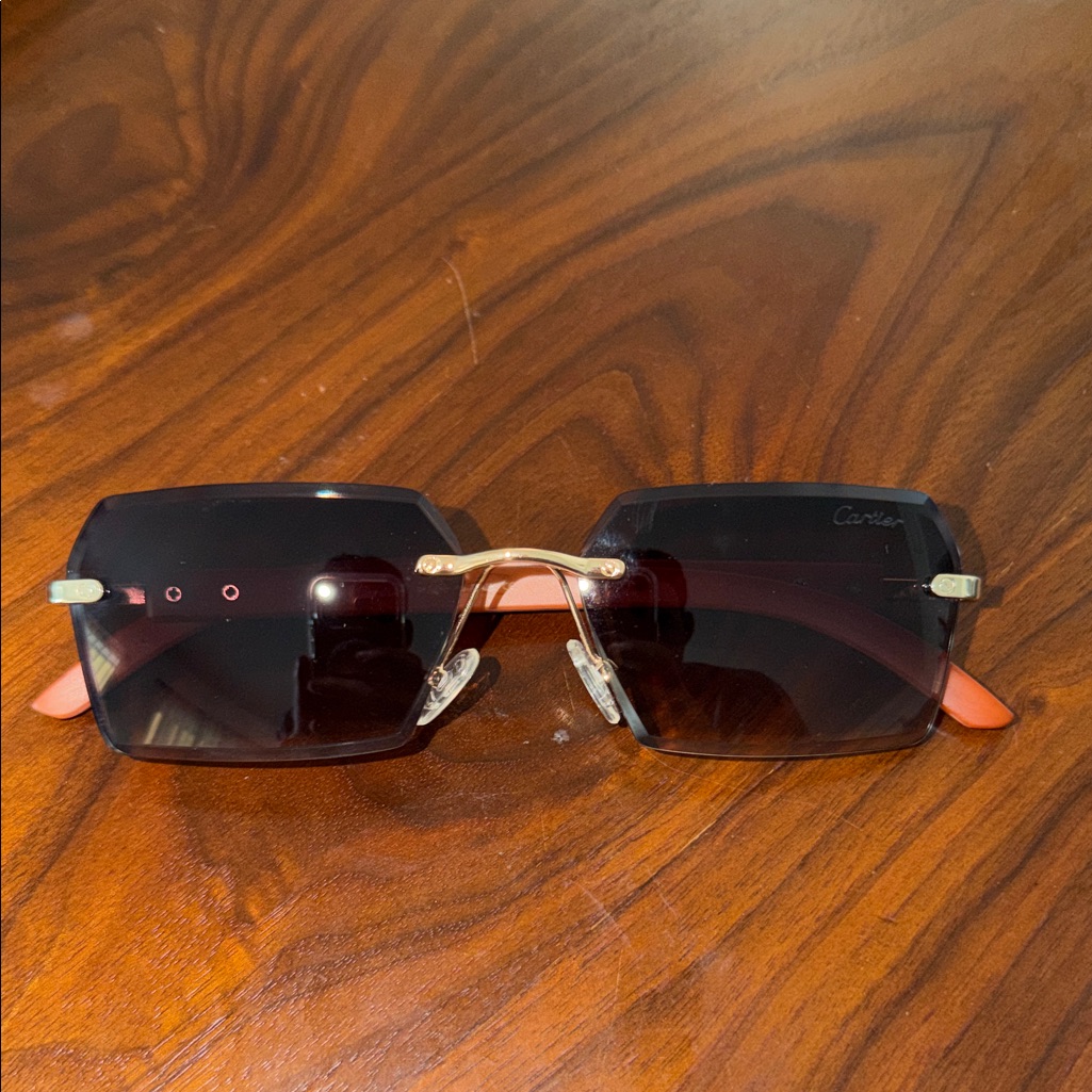 Cartier Rimless Sunglasses With Gold And Black Accents